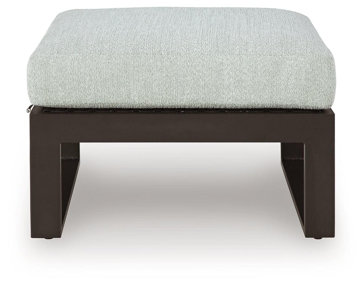 Beachloft Black/Gray Outdoor Ottoman with Cushion by Ashley at Eve Furniture