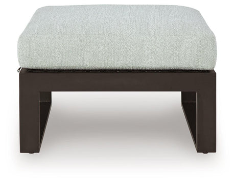 Beachloft Black/Gray Outdoor Ottoman with Cushion by Ashley at Eve Furniture