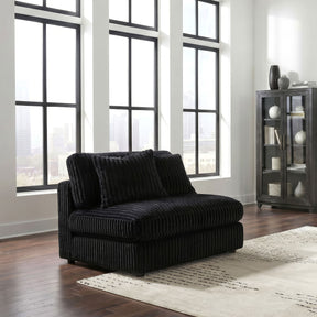 Blaine Black Upholstered Armless Chair by Coaster at Eve Furniture