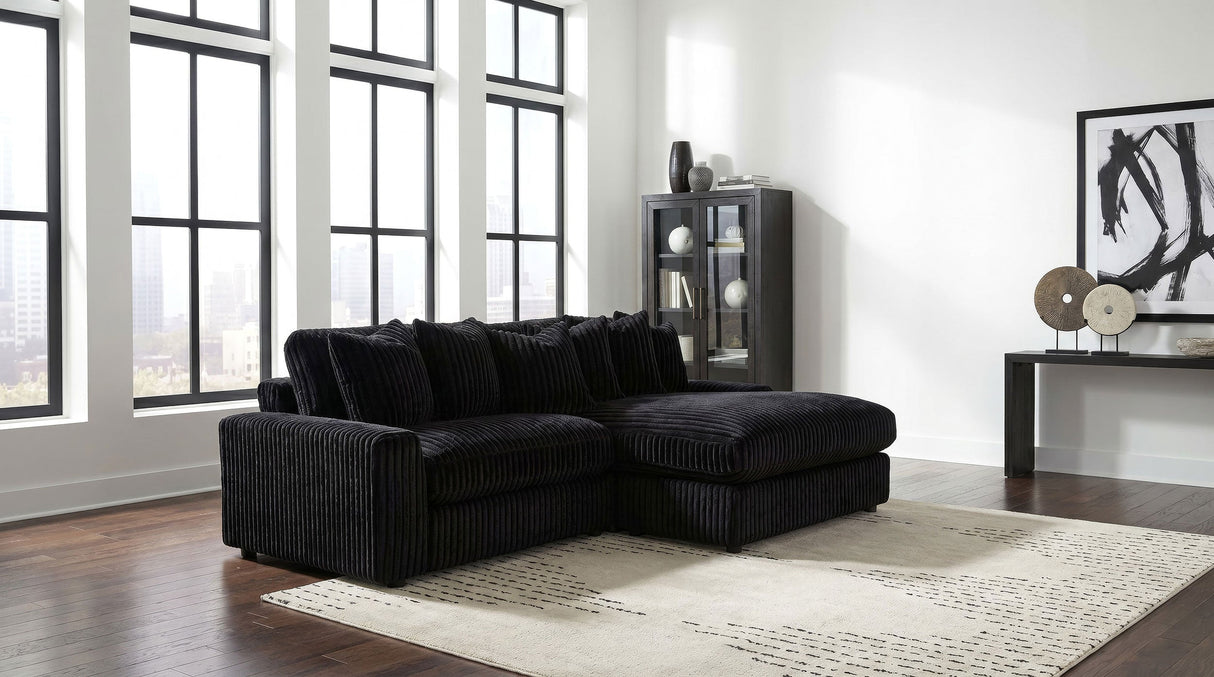 Blaine Black Upholstered Reversible Chaise Sectional Sofa by Coaster at Eve Furniture
