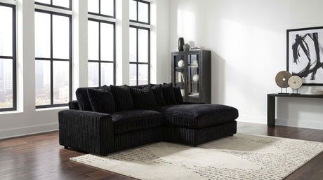 Blaine Black Upholstered Reversible Chaise Sectional Sofa by Coaster at Eve Furniture