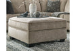 Bovarian Stone Ottoman by Ashley at Eve Furniture