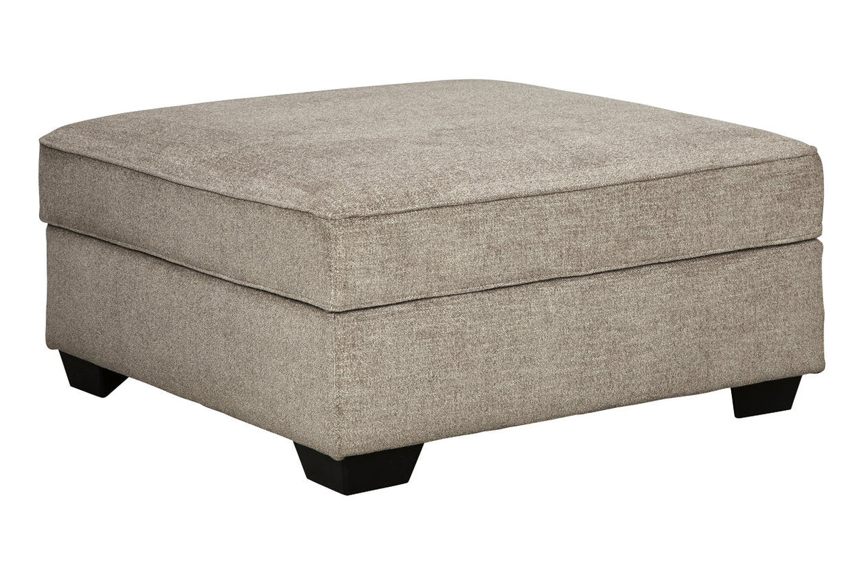 Bovarian Stone Ottoman by Ashley at Eve Furniture