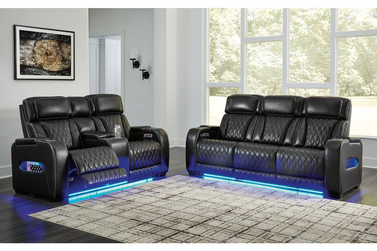 Boyington Black Dual Power Leather Power Reclining Sofa, Loveseat and Recliner by Ashley at Eve Furniture