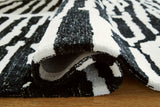 Bramshaw Black/Ivory Extra Large Rug by ASHLEY FURNITURE at Eve Furniture