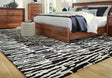 Bramshaw Black/Ivory Extra Large Rug by ASHLEY FURNITURE at Eve Furniture