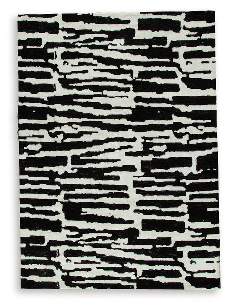 Bramshaw Black/Ivory Medium Rug by Ashley at Eve Furniture