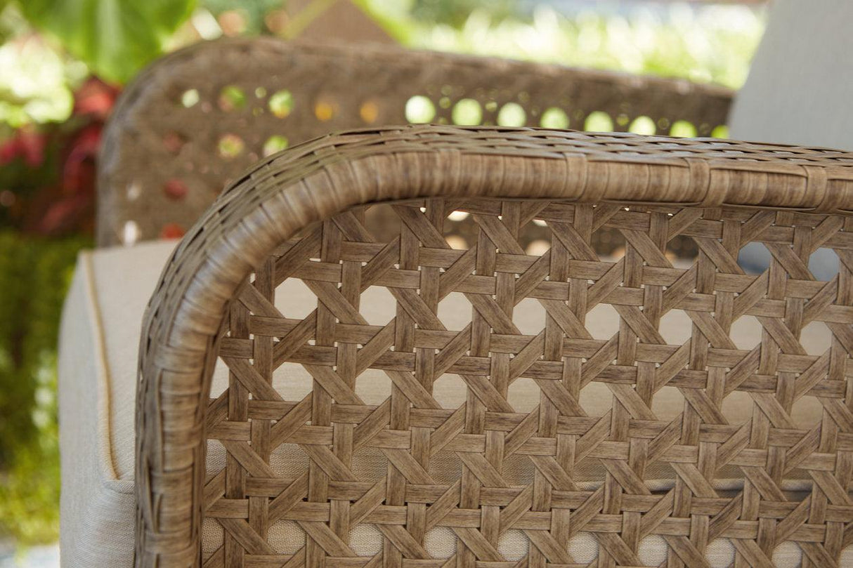 Braylee Driftwood Outdoor Loveseat with Table by Ashley at Eve Furniture