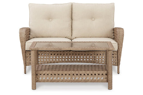 Braylee Driftwood Outdoor Loveseat with Table by Ashley at Eve Furniture
