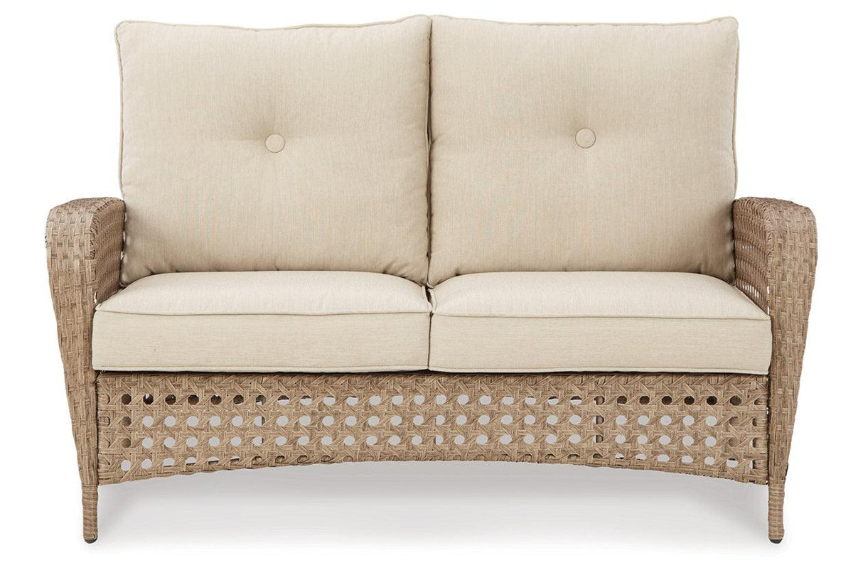 Braylee Driftwood Outdoor Loveseat with Table by Ashley at Eve Furniture