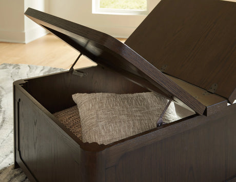 Breckington Dark Brown Coffee Table With Storage by Ashley at Eve Furniture