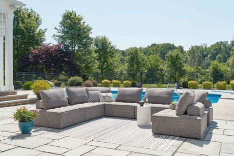 Bree Zee 8-Piece Outdoor Sectional with Lounge Chair in Brown by Ashley at Eve Furniture