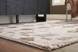 Brettler Beige/Brown Extra Large Rug by ASHLEY FURNITURE at Eve Furniture