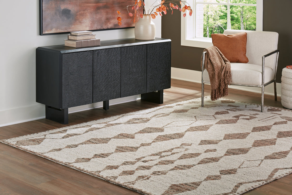 Brettler Beige/Brown Large Rug by Ashley at Eve Furniture