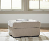 Bridgepoint Stone Ottoman by Ashley at Eve Furniture