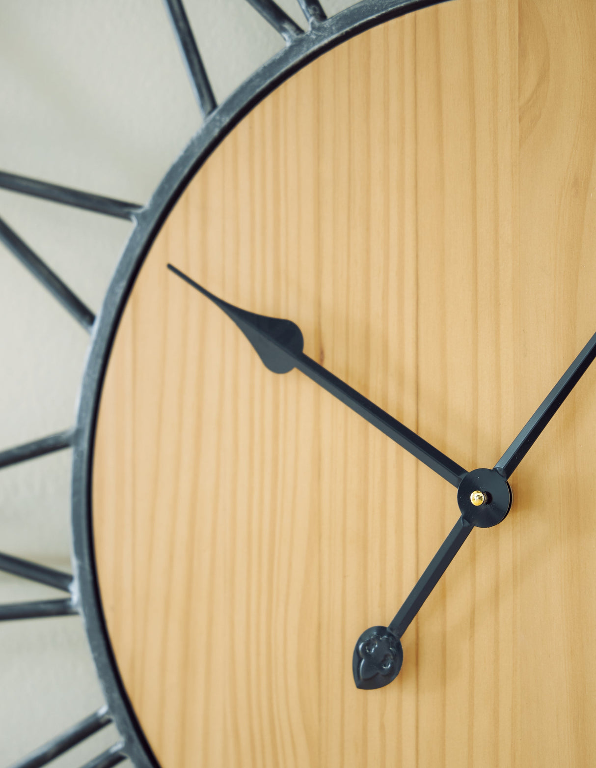 Brockett Black/Natural Wall Clock by ASHLEY FURNITURE at Eve Furniture