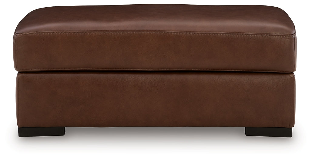 Brogliano Canyon Leather Ottoman by Ashley at Eve Furniture
