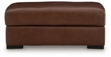 Brogliano Canyon Leather Ottoman by Ashley at Eve Furniture