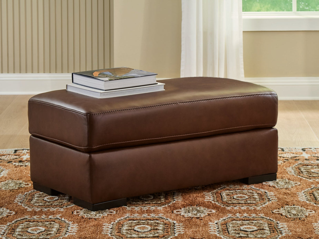 Brogliano Canyon Leather Ottoman by Ashley at Eve Furniture