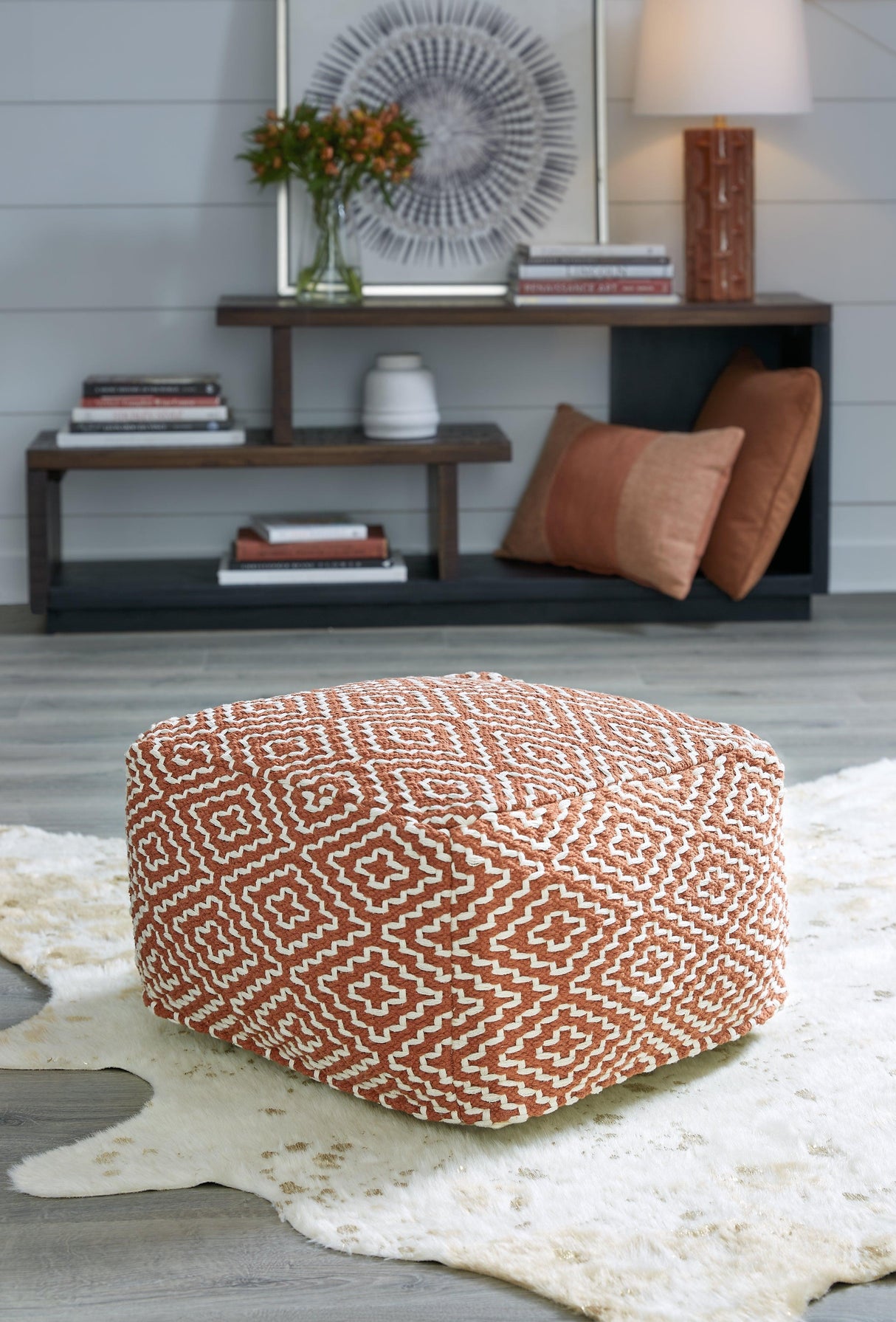 Brynnsen Rust/Ivory Pouf by Ashley at Eve Furniture