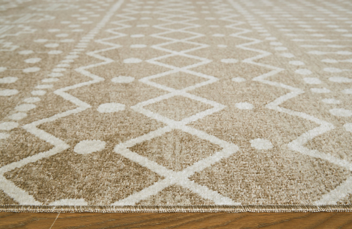 Bunchly Tan/Brown/Cream Medium Rug by ASHLEY FURNITURE at Eve Furniture