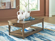 Burkbyer Brown Coffee Table by Ashley at Eve Furniture