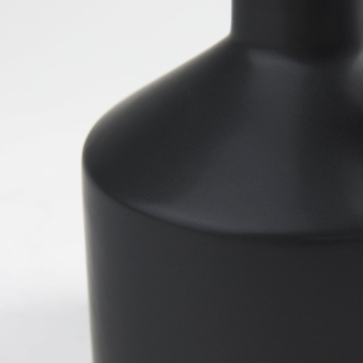 Burton 10.8H Small Matte Black Ceramic Jug Vase by Mercana at Eve Furniture