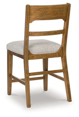 Cabalynn Oatmeal/Light Brown Counter Height Barstool, Set of 2 by Ashley at Eve Furniture