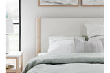 Cadmori Tan/Beige Queen Upholstered Platform Bed by Ashley at Eve Furniture