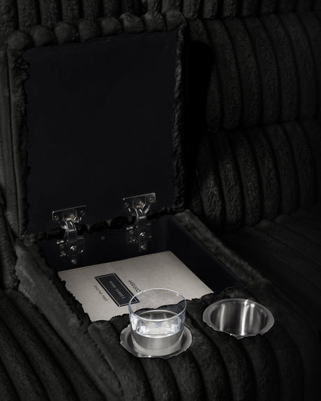 Calantha Black Manual Reclining Sectional by New Era Innovations at Eve Furniture