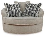 Calnita Sisal Oversized Swivel Accent Chair by Ashley at Eve Furniture