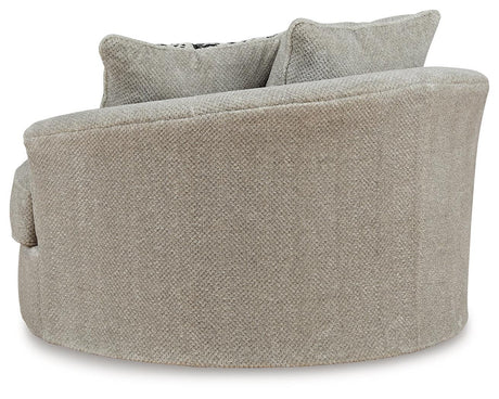 Calnita Sisal Oversized Swivel Accent Chair by Ashley at Eve Furniture