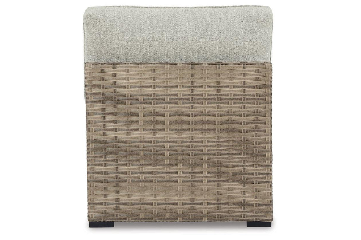 Calworth Beige Outdoor Armless Chair by Ashley at Eve Furniture