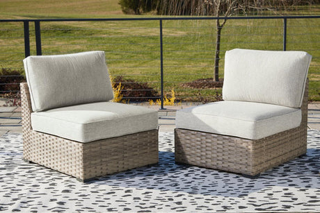 Calworth Beige Outdoor Armless Chair by Ashley at Eve Furniture