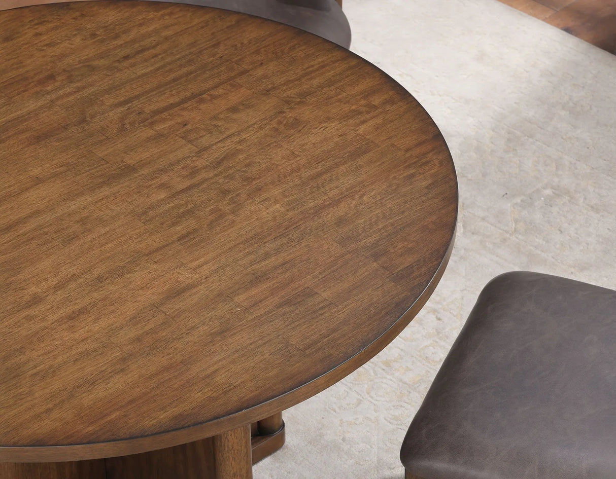 Cambridge Burnished Chestnut 47.25″ Round Dining Table by Steve Silver at Eve Furniture