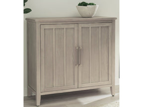Camden Two Door Two Drawer Bar Cabinet with Stemware Rack and Wine Rack in Chai by Modus Furniture at Eve Furniture