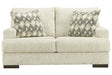 Caretti Parchment Loveseat by Ashley at Eve Furniture