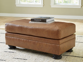 Carianna Caramel Ottoman by Ashley at Eve Furniture