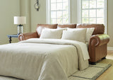 Carianna Caramel Queen Leather Sofa Sleeper by Ashley at Eve Furniture