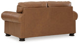 Carianna Caramel Loveseat by Ashley at Eve Furniture