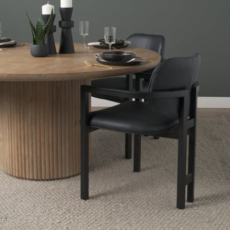 Carlisle Curved Back Black Leather Tripod Frame Dining Armchair by Mercana at Eve Furniture