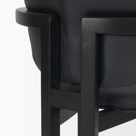 Carlisle Curved Back Black Leather Tripod Frame Dining Armchair by Mercana at Eve Furniture