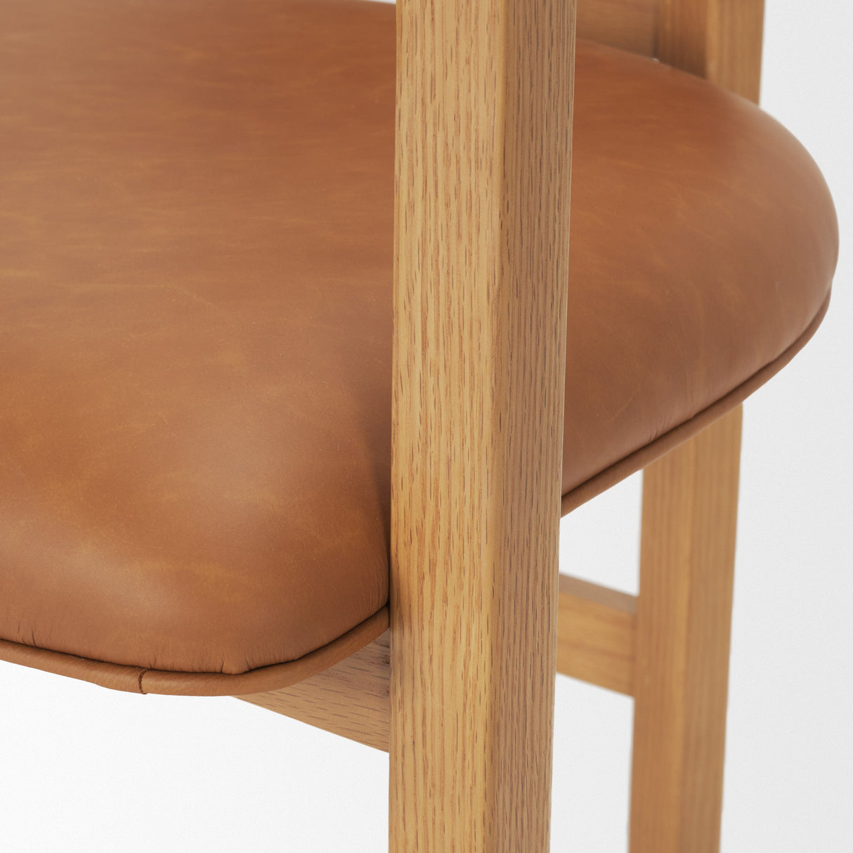 Carlisle Curved Back Tan Leather Tripod Frame Dining Armchair by Mercana at Eve Furniture