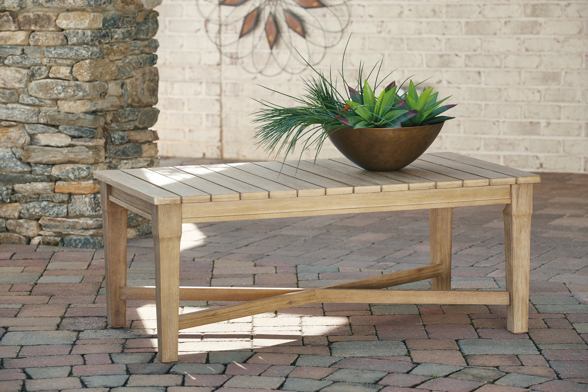 Carter Hall Beige Outdoor Coffee Table by Ashley at Eve Furniture