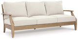 Carter Hall Beige Outdoor Sofa with Cushion by Ashley at Eve Furniture