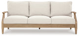 Carter Hall Beige Outdoor Sofa with Cushion by Ashley at Eve Furniture