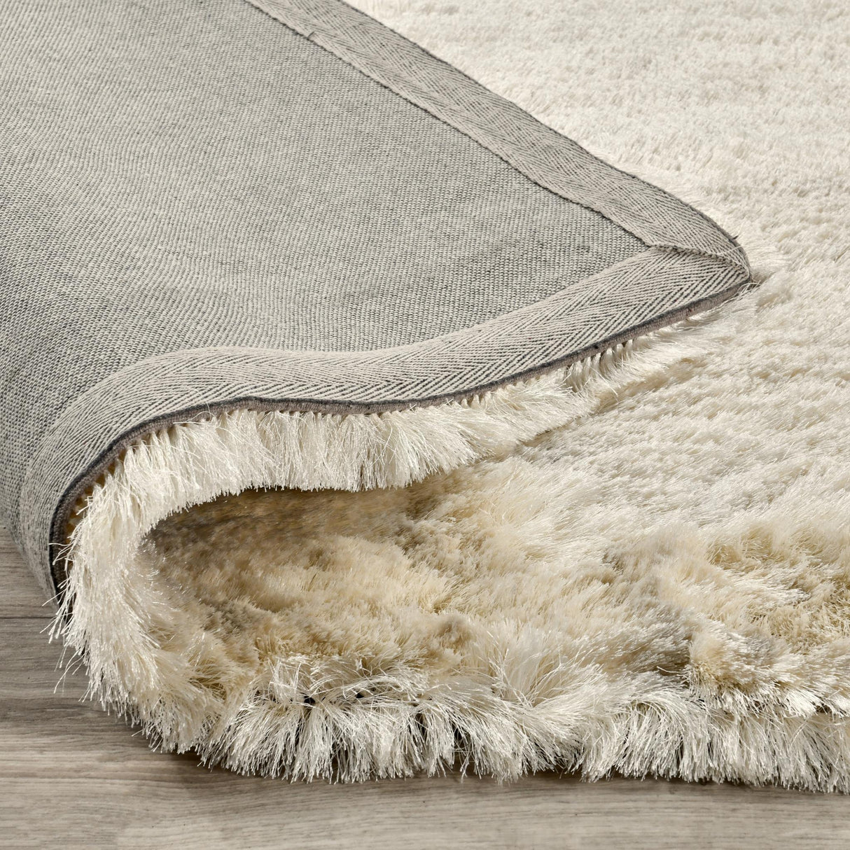 Carter Shag Ivory Rug by Classic Home at Eve Furniture