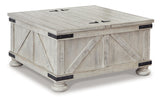 Carynhurst Coffee Table with 1 End Table in Whitewash by Ashley at Eve Furniture