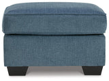 Cashton Blue Ottoman by Ashley at Eve Furniture
