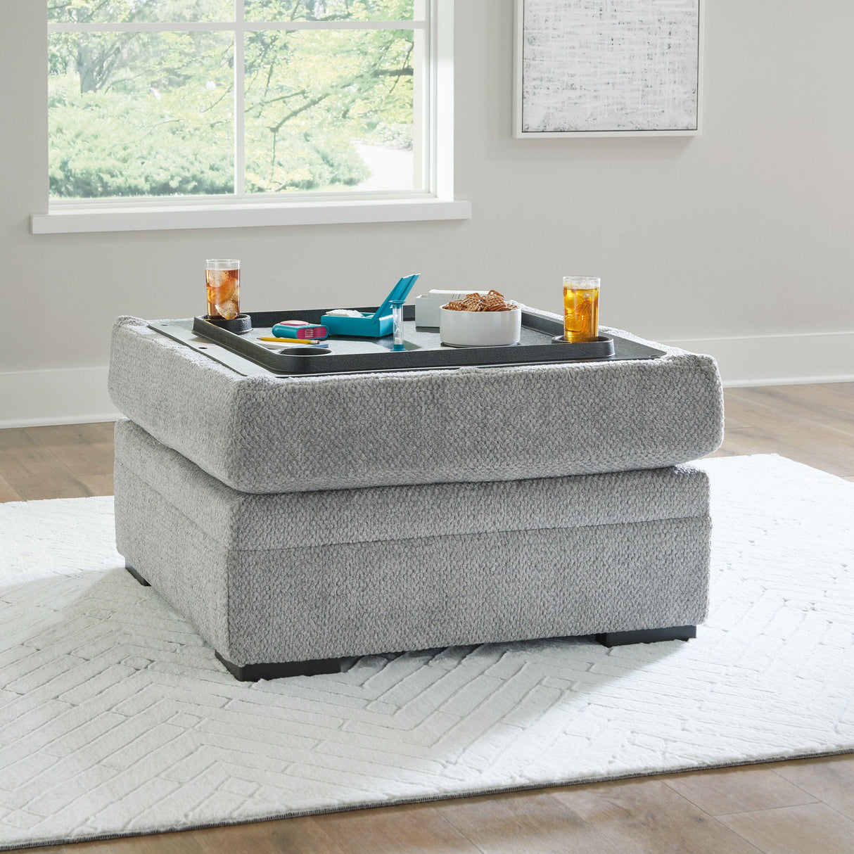 Casselbury Cement Ottoman With Storage by Ashley at Eve Furniture